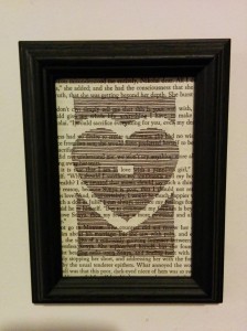 bookbw art featuring a page from War and Peace with a heart surrounding the word love